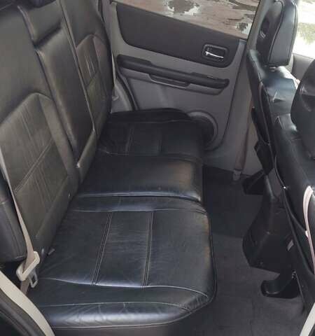 Чорний Ніссан ІксТрейл, об'ємом двигуна 2.18 л та пробігом 270 тис. км за 6300 $, фото 1 на Automoto.ua