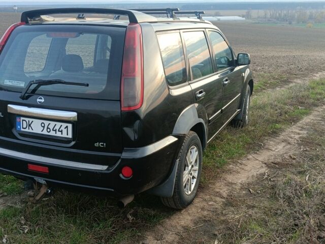 Черный Ниссан ИксТрейл, объемом двигателя 2.2 л и пробегом 294 тыс. км за 5000 $, фото 1 на Automoto.ua