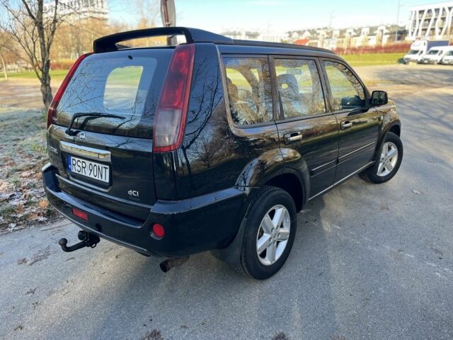 Чорний Ніссан ІксТрейл, об'ємом двигуна 2.2 л та пробігом 279 тис. км за 3483 $, фото 5 на Automoto.ua