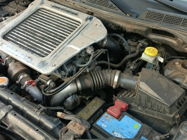 Черный Ниссан ИксТрейл, объемом двигателя 2.2 л и пробегом 294 тыс. км за 5000 $, фото 7 на Automoto.ua