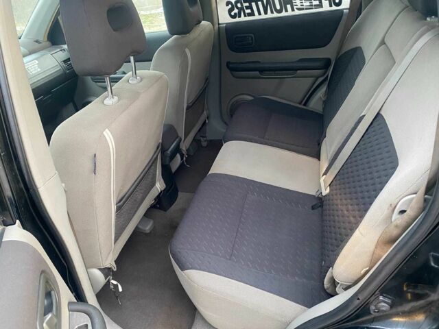 Черный Ниссан ИксТрейл, объемом двигателя 2.2 л и пробегом 251 тыс. км за 3800 $, фото 11 на Automoto.ua