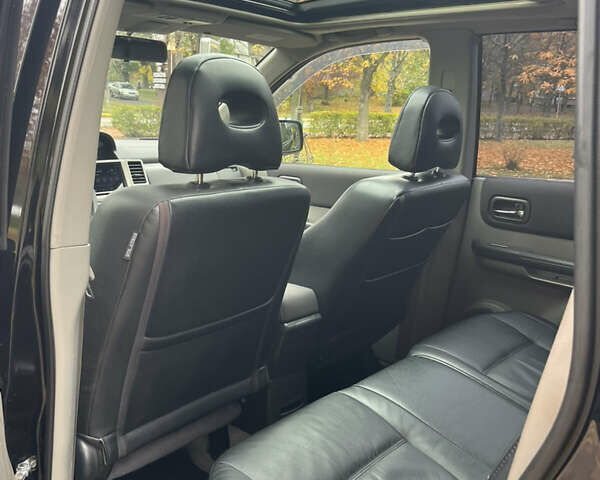 Чорний Ніссан ІксТрейл, об'ємом двигуна 2.5 л та пробігом 179 тис. км за 6800 $, фото 31 на Automoto.ua