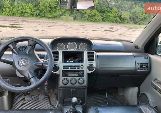 Чорний Ніссан ІксТрейл, об'ємом двигуна 2.18 л та пробігом 270 тис. км за 6300 $, фото 4 на Automoto.ua