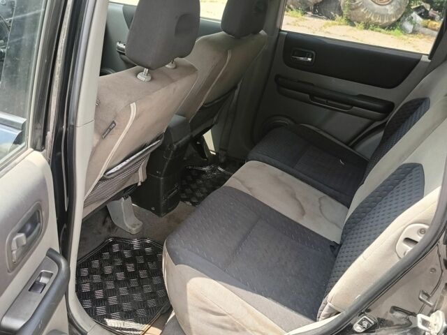 Черный Ниссан ИксТрейл, объемом двигателя 2.2 л и пробегом 338 тыс. км за 2900 $, фото 5 на Automoto.ua