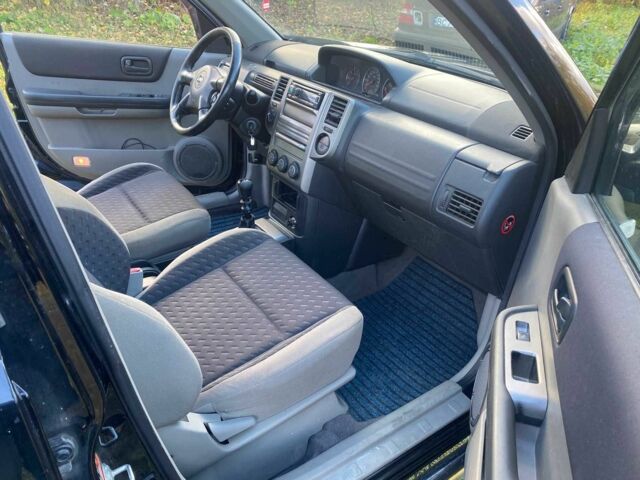 Черный Ниссан ИксТрейл, объемом двигателя 2.2 л и пробегом 339 тыс. км за 3850 $, фото 8 на Automoto.ua