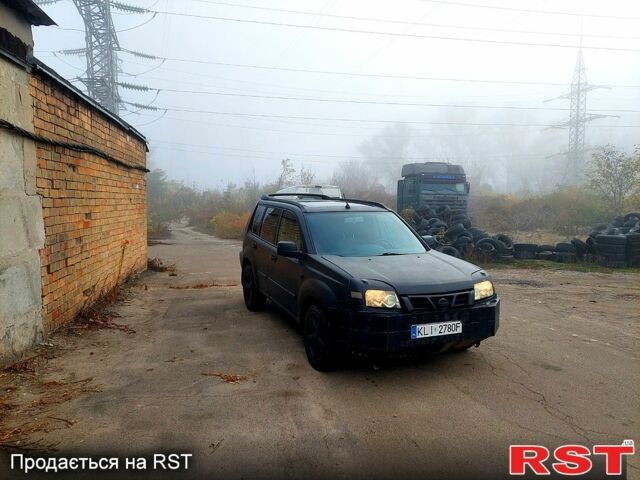 Чорний Ніссан ІксТрейл, об'ємом двигуна 2.2 л та пробігом 300 тис. км за 2750 $, фото 2 на Automoto.ua