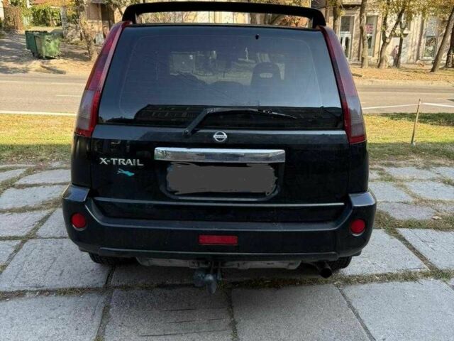 Чорний Ніссан ІксТрейл, об'ємом двигуна 2.2 л та пробігом 360 тис. км за 4500 $, фото 1 на Automoto.ua