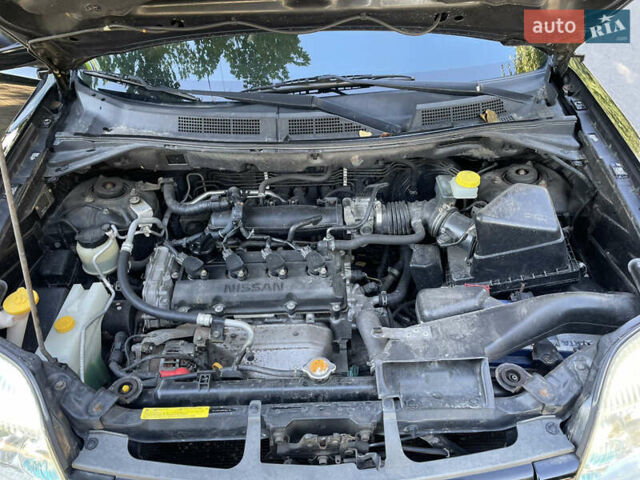 Черный Ниссан ИксТрейл, объемом двигателя 2 л и пробегом 215 тыс. км за 7000 $, фото 22 на Automoto.ua
