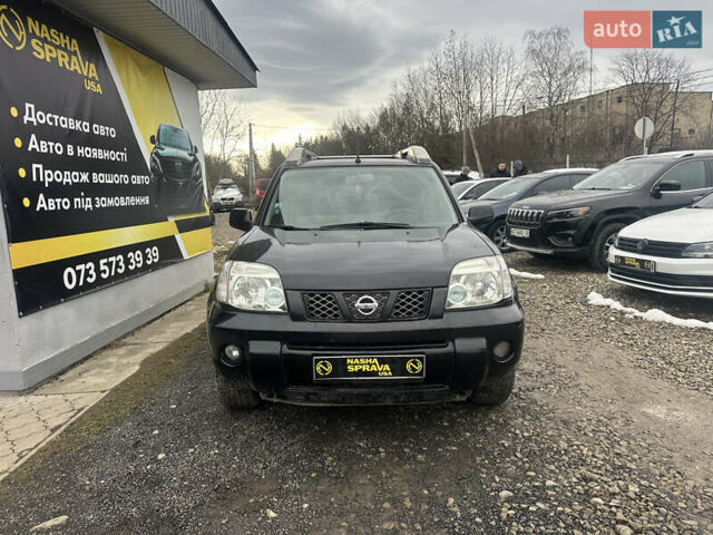 Черный Ниссан ИксТрейл, объемом двигателя 2 л и пробегом 173 тыс. км за 4700 $, фото 1 на Automoto.ua