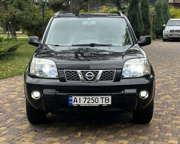 Чорний Ніссан ІксТрейл, об'ємом двигуна 2.5 л та пробігом 179 тис. км за 6800 $, фото 6 на Automoto.ua