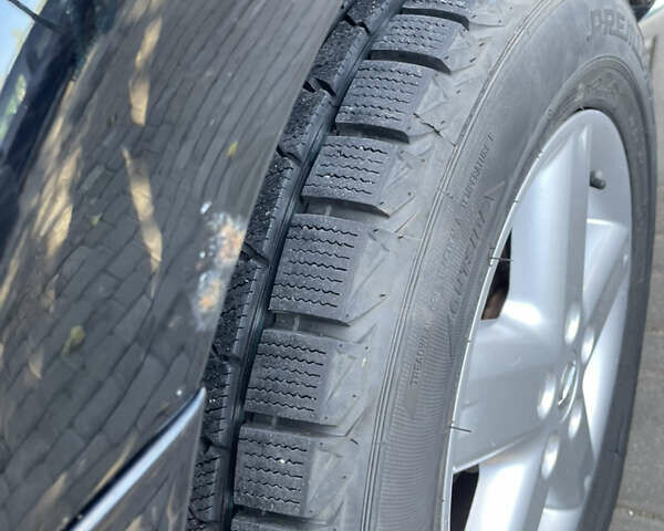 Черный Ниссан ИксТрейл, объемом двигателя 2 л и пробегом 215 тыс. км за 7000 $, фото 25 на Automoto.ua