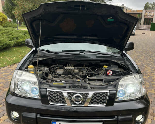 Чорний Ніссан ІксТрейл, об'ємом двигуна 2.5 л та пробігом 179 тис. км за 6800 $, фото 24 на Automoto.ua