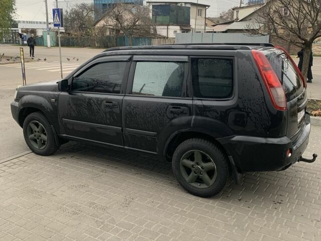 Чорний Ніссан ІксТрейл, об'ємом двигуна 2.2 л та пробігом 390 тис. км за 3561 $, фото 3 на Automoto.ua
