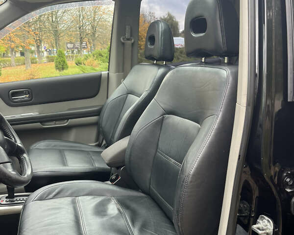 Чорний Ніссан ІксТрейл, об'ємом двигуна 2.5 л та пробігом 179 тис. км за 6800 $, фото 16 на Automoto.ua