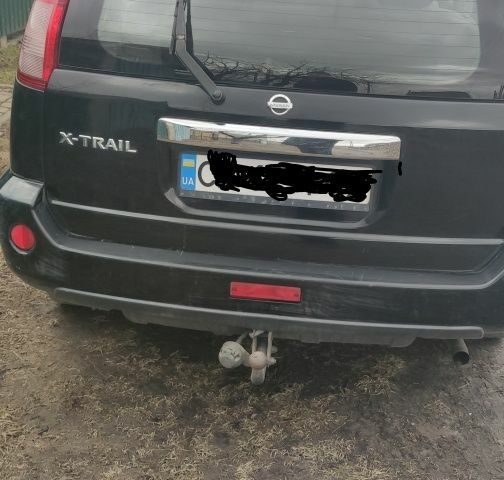 Черный Ниссан ИксТрейл, объемом двигателя 2 л и пробегом 270 тыс. км за 2700 $, фото 1 на Automoto.ua