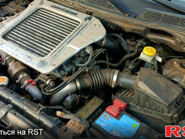 Черный Ниссан ИксТрейл, объемом двигателя 2.2 л и пробегом 294 тыс. км за 5000 $, фото 3 на Automoto.ua