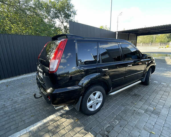 Черный Ниссан ИксТрейл, объемом двигателя 2 л и пробегом 215 тыс. км за 7000 $, фото 11 на Automoto.ua