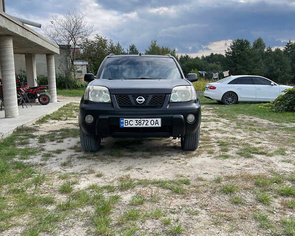 Черный Ниссан ИксТрейл, объемом двигателя 2.18 л и пробегом 394 тыс. км за 6500 $, фото 2 на Automoto.ua