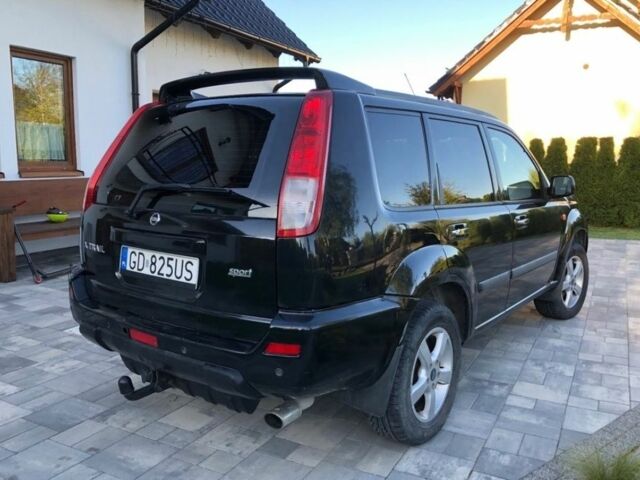 Черный Ниссан ИксТрейл, объемом двигателя 2.2 л и пробегом 266 тыс. км за 2200 $, фото 1 на Automoto.ua