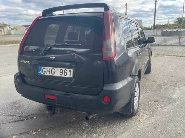 Чорний Ніссан ІксТрейл, об'ємом двигуна 2.2 л та пробігом 308 тис. км за 2800 $, фото 3 на Automoto.ua