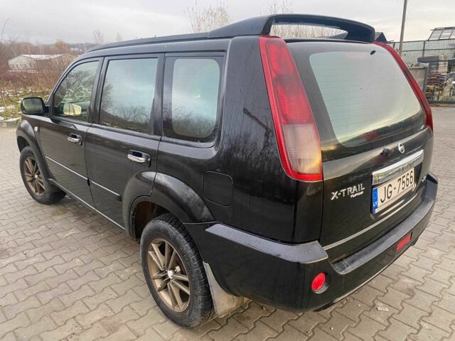 Черный Ниссан ИксТрейл, объемом двигателя 2.2 л и пробегом 251 тыс. км за 3800 $, фото 3 на Automoto.ua