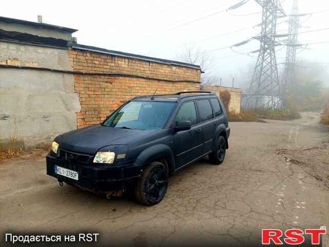 Чорний Ніссан ІксТрейл, об'ємом двигуна 2.2 л та пробігом 300 тис. км за 2750 $, фото 4 на Automoto.ua