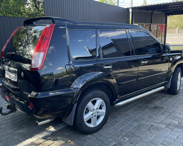 Черный Ниссан ИксТрейл, объемом двигателя 2 л и пробегом 215 тыс. км за 7000 $, фото 10 на Automoto.ua