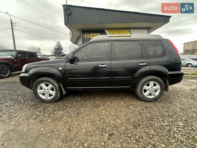 Черный Ниссан ИксТрейл, объемом двигателя 2 л и пробегом 173 тыс. км за 4700 $, фото 7 на Automoto.ua