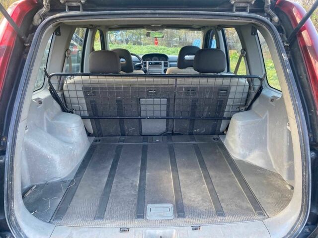 Черный Ниссан ИксТрейл, объемом двигателя 2.2 л и пробегом 339 тыс. км за 3850 $, фото 11 на Automoto.ua