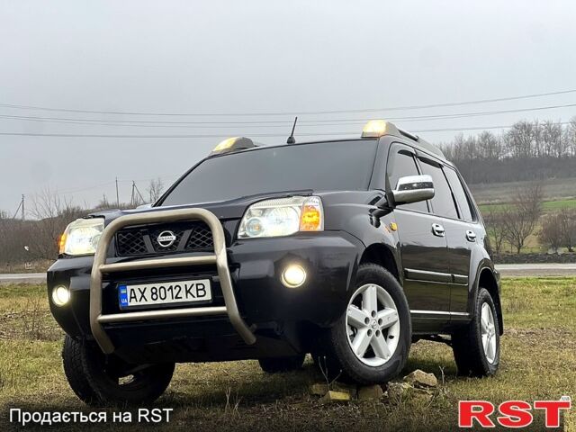 Черный Ниссан ИксТрейл, объемом двигателя 2 л и пробегом 250 тыс. км за 6000 $, фото 10 на Automoto.ua