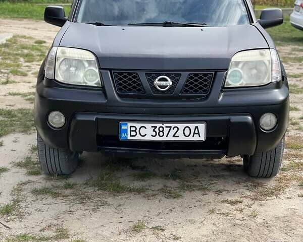 Черный Ниссан ИксТрейл, объемом двигателя 2.18 л и пробегом 394 тыс. км за 6500 $, фото 1 на Automoto.ua