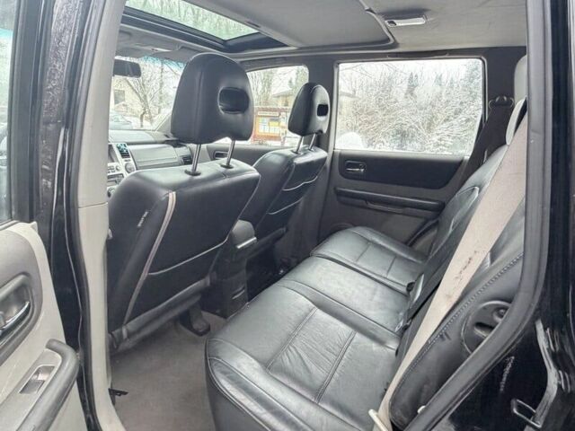 Черный Ниссан ИксТрейл, объемом двигателя 2.2 л и пробегом 217 тыс. км за 2974 $, фото 3 на Automoto.ua