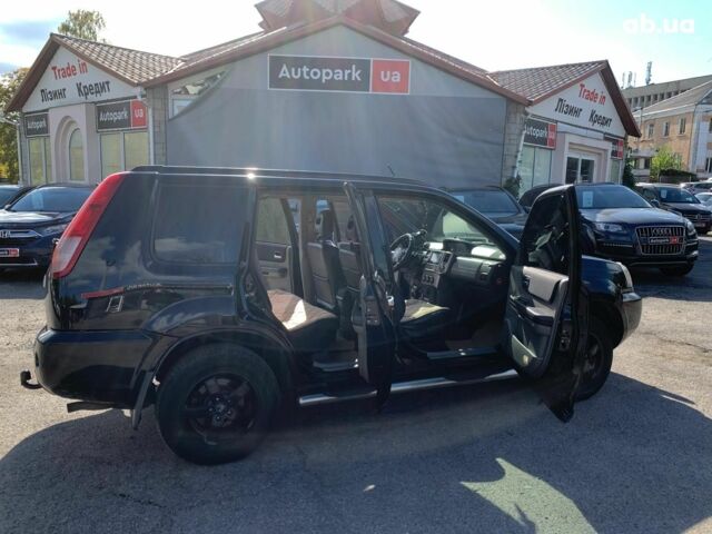 Черный Ниссан ИксТрейл, объемом двигателя 2.5 л и пробегом 295 тыс. км за 6890 $, фото 12 на Automoto.ua