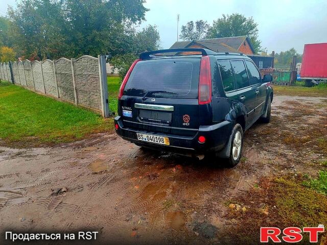 Черный Ниссан ИксТрейл, объемом двигателя 2.2 л и пробегом 248 тыс. км за 3800 $, фото 1 на Automoto.ua