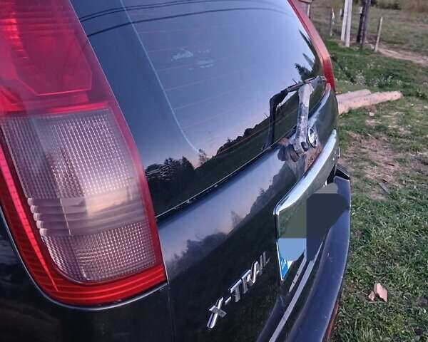 Чорний Ніссан ІксТрейл, об'ємом двигуна 2.18 л та пробігом 396 тис. км за 5200 $, фото 4 на Automoto.ua