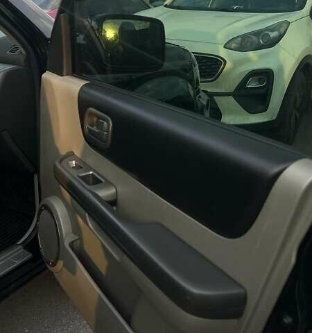 Черный Ниссан ИксТрейл, объемом двигателя 2.5 л и пробегом 261 тыс. км за 8300 $, фото 9 на Automoto.ua