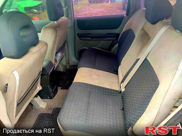 Черный Ниссан ИксТрейл, объемом двигателя 2.2 л и пробегом 248 тыс. км за 3800 $, фото 9 на Automoto.ua