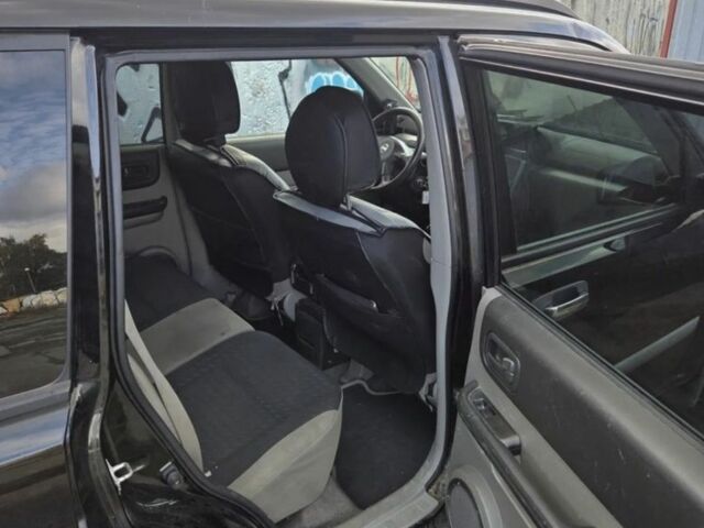 Черный Ниссан ИксТрейл, объемом двигателя 2.2 л и пробегом 220 тыс. км за 2250 $, фото 9 на Automoto.ua