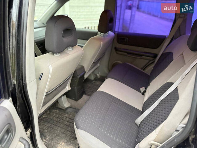 Чорний Ніссан ІксТрейл, об'ємом двигуна 2.2 л та пробігом 290 тис. км за 3750 $, фото 8 на Automoto.ua