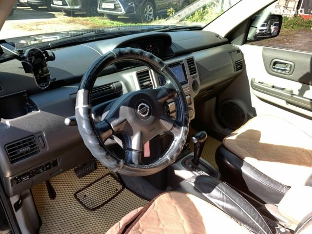 Черный Ниссан ИксТрейл, объемом двигателя 2.5 л и пробегом 295 тыс. км за 6890 $, фото 30 на Automoto.ua