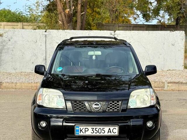 Черный Ниссан ИксТрейл, объемом двигателя 2.2 л и пробегом 360 тыс. км за 7300 $, фото 1 на Automoto.ua