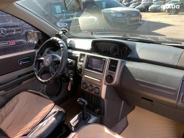 Черный Ниссан ИксТрейл, объемом двигателя 2.5 л и пробегом 295 тыс. км за 6890 $, фото 24 на Automoto.ua