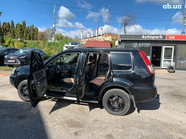 Черный Ниссан ИксТрейл, объемом двигателя 2.5 л и пробегом 295 тыс. км за 6890 $, фото 14 на Automoto.ua