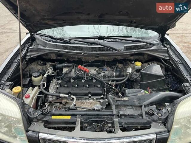 Черный Ниссан ИксТрейл, объемом двигателя 2.5 л и пробегом 285 тыс. км за 6500 $, фото 21 на Automoto.ua