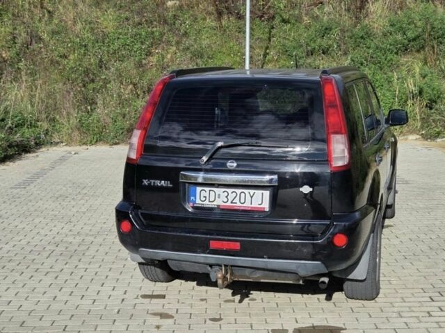 Черный Ниссан ИксТрейл, объемом двигателя 2.2 л и пробегом 220 тыс. км за 2250 $, фото 5 на Automoto.ua