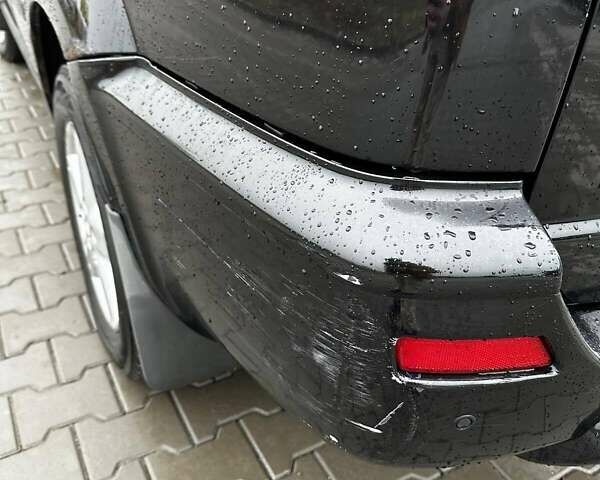 Черный Ниссан ИксТрейл, объемом двигателя 2.5 л и пробегом 282 тыс. км за 6250 $, фото 9 на Automoto.ua