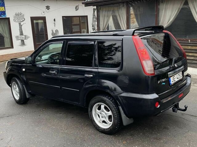 Черный Ниссан ИксТрейл, объемом двигателя 2.2 л и пробегом 226 тыс. км за 3650 $, фото 3 на Automoto.ua