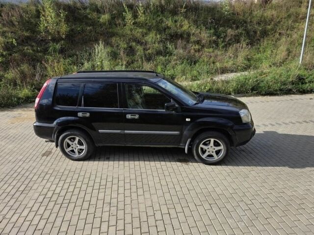 Черный Ниссан ИксТрейл, объемом двигателя 2.2 л и пробегом 220 тыс. км за 2250 $, фото 3 на Automoto.ua