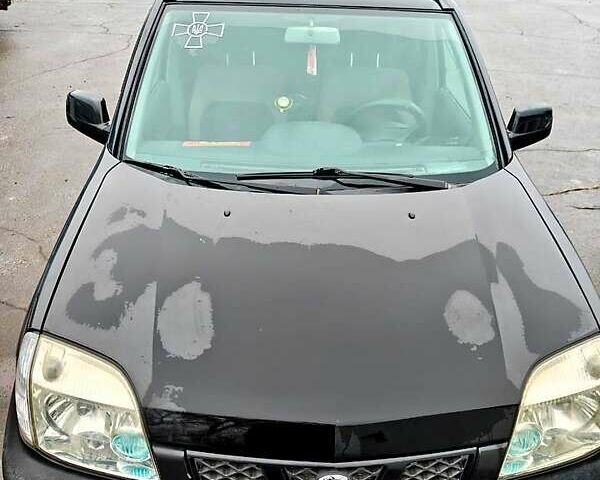 Черный Ниссан ИксТрейл, объемом двигателя 2.2 л и пробегом 100 тыс. км за 5500 $, фото 3 на Automoto.ua