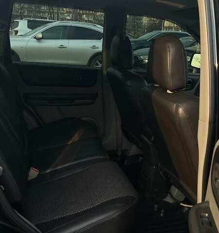 Черный Ниссан ИксТрейл, объемом двигателя 2.5 л и пробегом 261 тыс. км за 8300 $, фото 12 на Automoto.ua